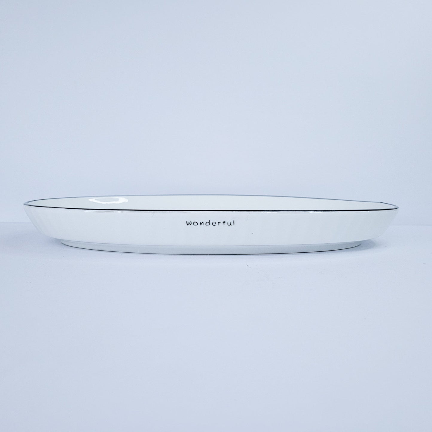 Plato ovalo c/borde negro 1351255-118